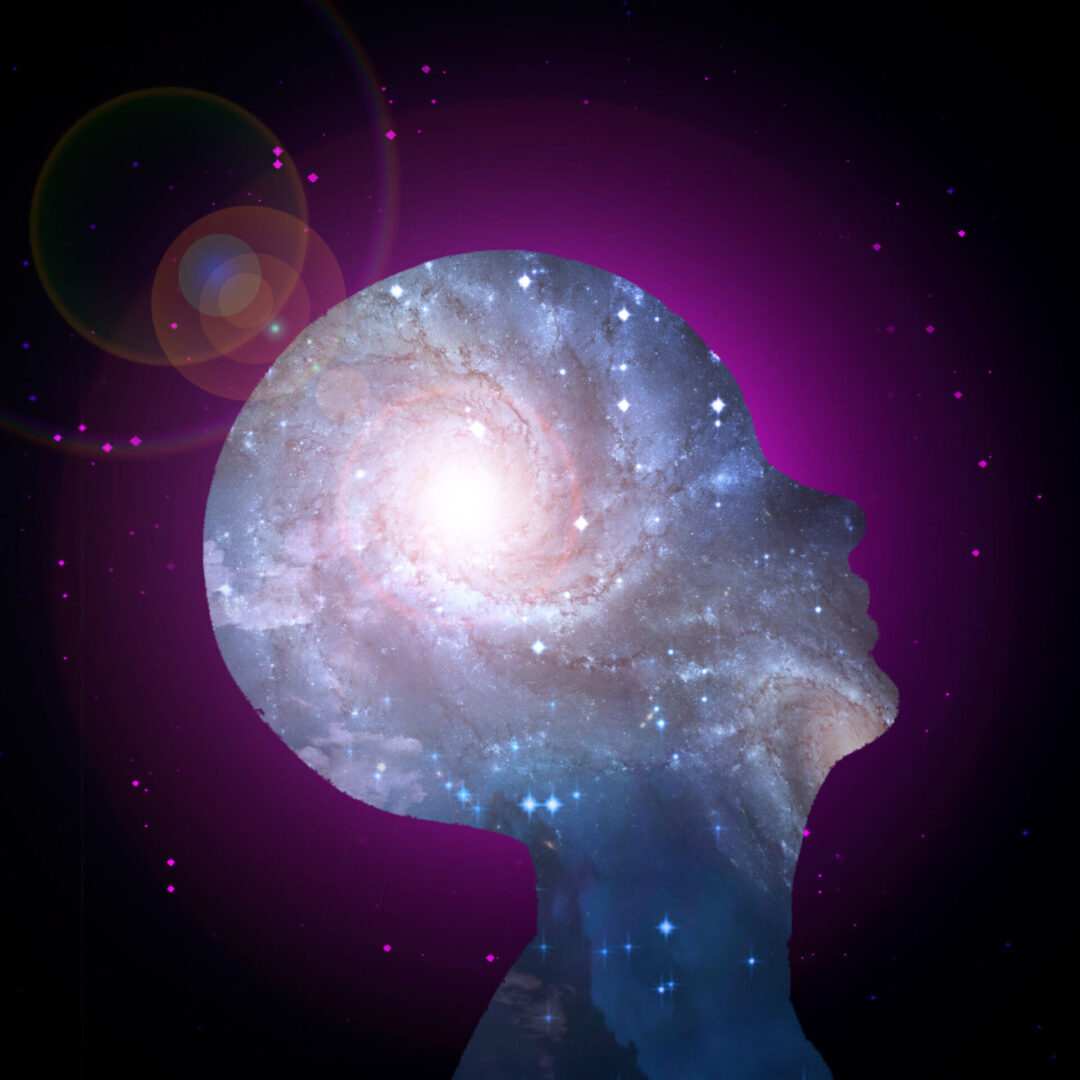 Silhouette with galaxy and bright light.